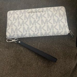 Michael Kors Zip Close Full Size wallet.